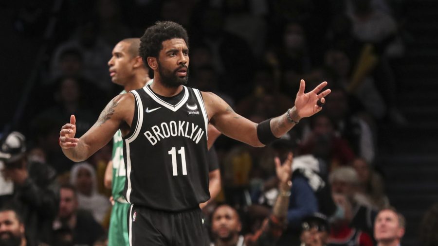 Apr 23, 2022; Brooklyn, New York, USA;  Brooklyn Nets guard Kyrie Irving (11) looks towards an official after a call in the third quarter against the Boston Celtics at Barclays Center. Mandatory Credit: Wendell Cruz-USA TODAY Sports
